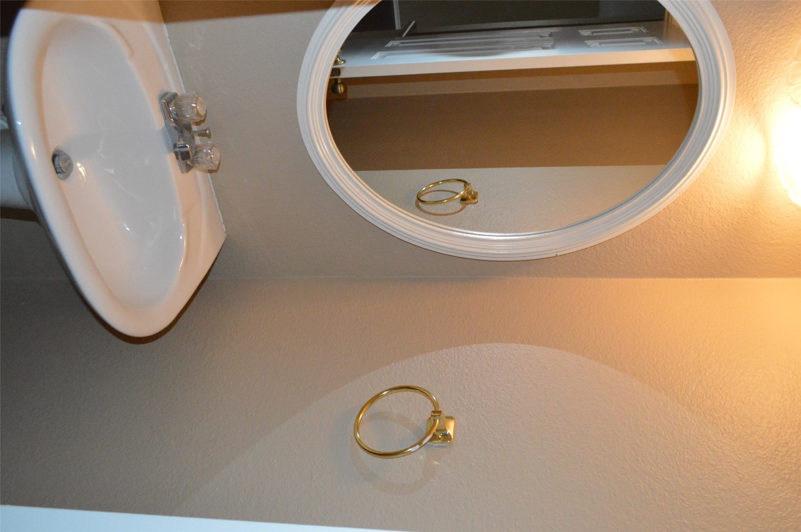 2014 Carriage Club Drive Cedar Park, TX 78613 - Photo 8 of 19 a bathroom with a sink and mirror