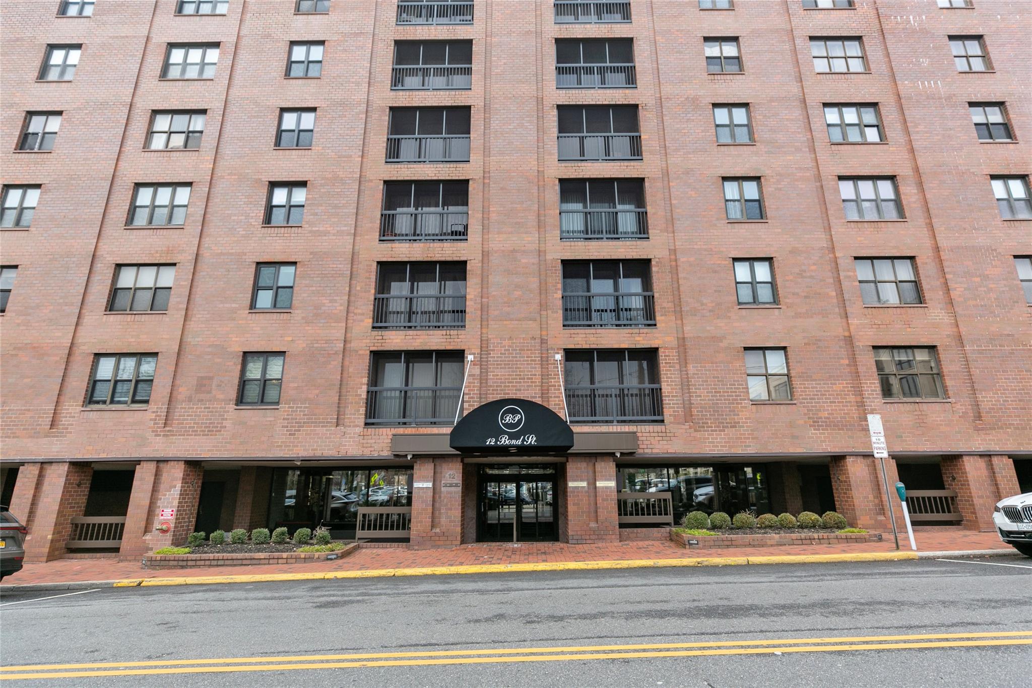 12 Bond Street, Unit 5E Great Neck, NY 11021 - Photo 1 of 1 View of building exterior