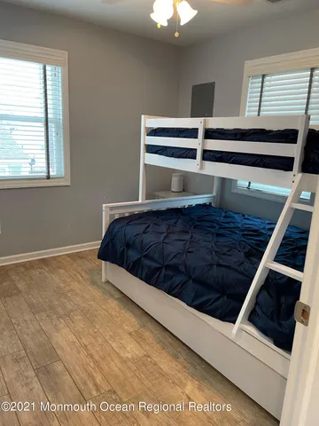 a room with stairs and windows