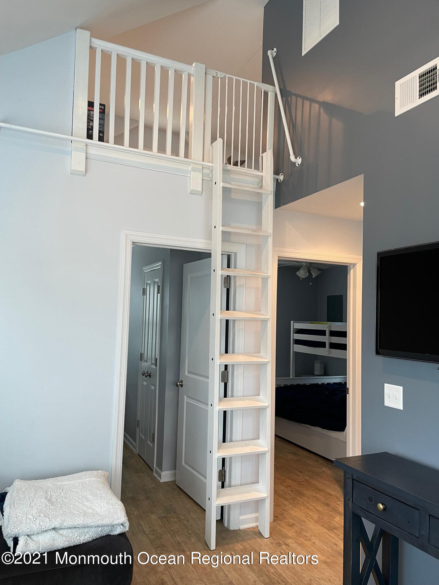 106 West Pompano Way Lavallette, NJ 08735 - Photo 13 of 27 a view of a livingroom with furniture and staircase