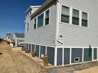 a front view of a house with glass windows