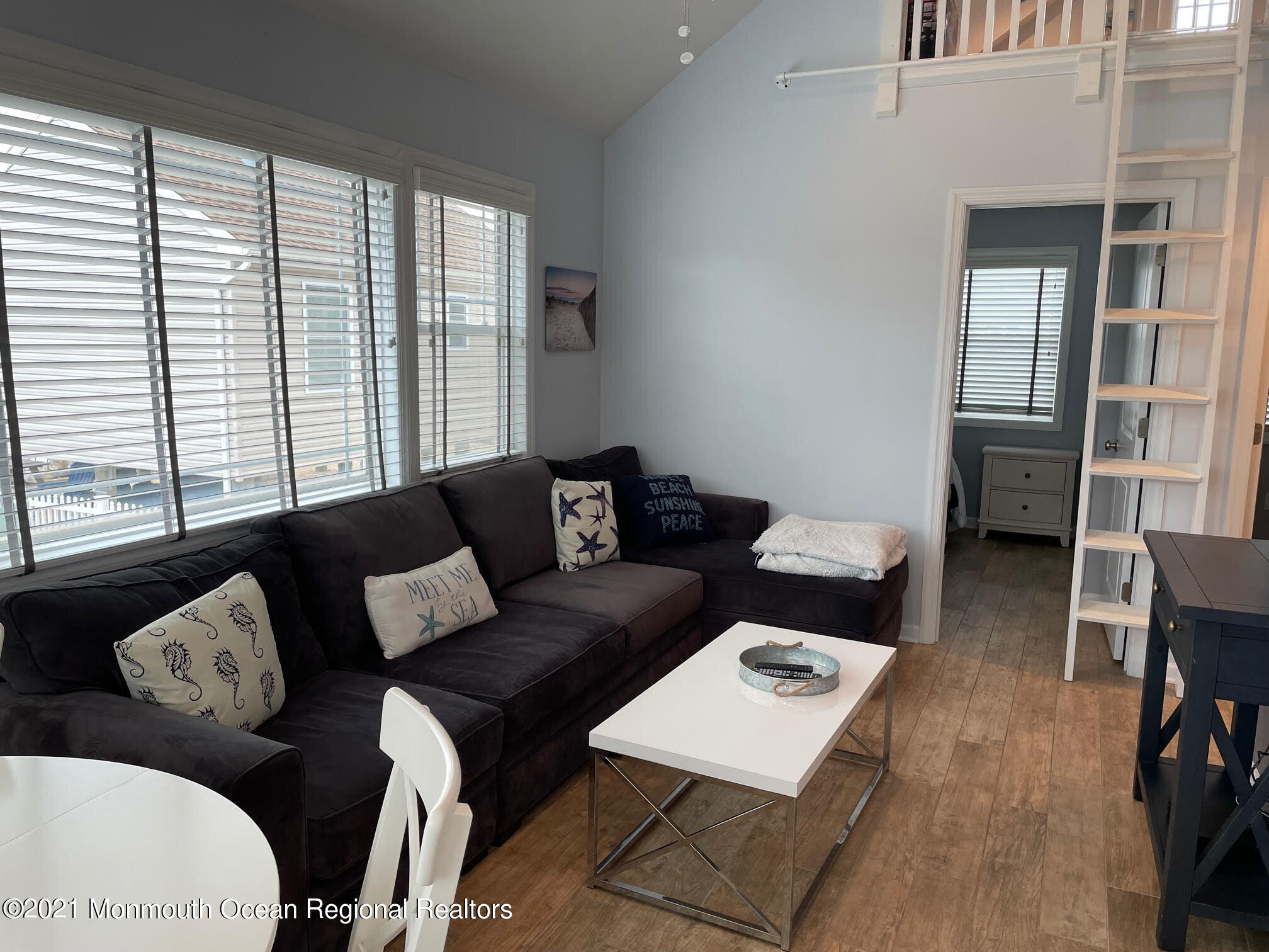 106 West Pompano Way Lavallette, NJ 08735 - Photo 10 of 27 a living room with furniture and a large window
