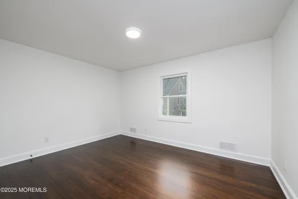 a view of small space with racks on the wall
