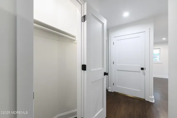 a view of entryway with a door