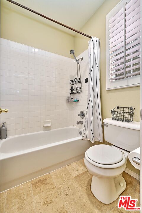 409 Spring Park Road Camarillo, CA 93012 - Photo 16 of 31 a white toilet sitting next to a bath tub shower