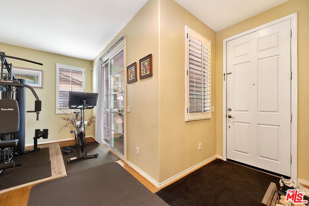 409 Spring Park Road Camarillo, CA 93012 - Photo 2 of 31 a view of a room with gym equipment