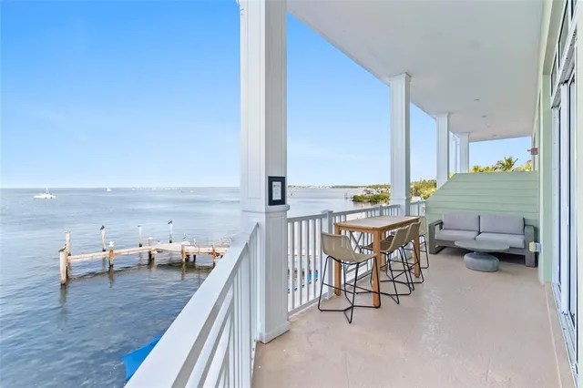 a view of a balcony with chairs