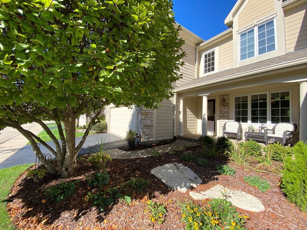 2428 Ridgewood Court Aurora, IL 60502 - Photo 1 of 40 a backyard of a house with lots of green space