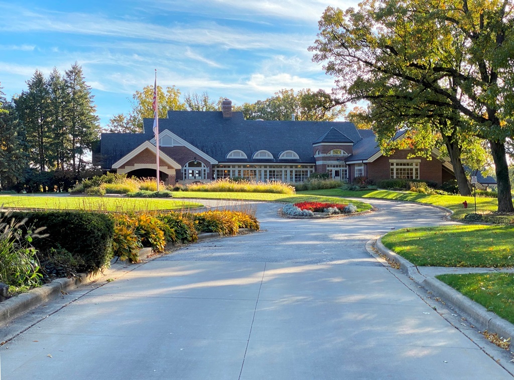 2428 Ridgewood Court Aurora, IL 60502 - Photo 36 of 40 a view of a swimming pool with a lawn chairs under an umbrella