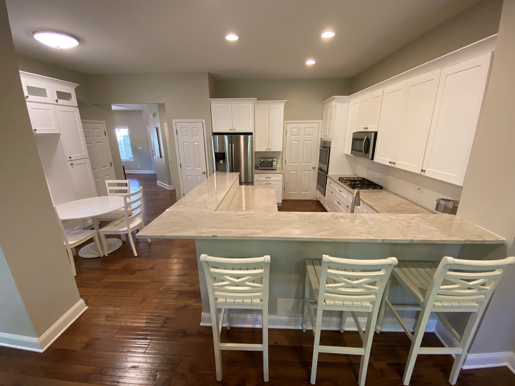 2428 Ridgewood Court Aurora, IL 60502 - Photo 9 of 40 a view of a dining room with furniture