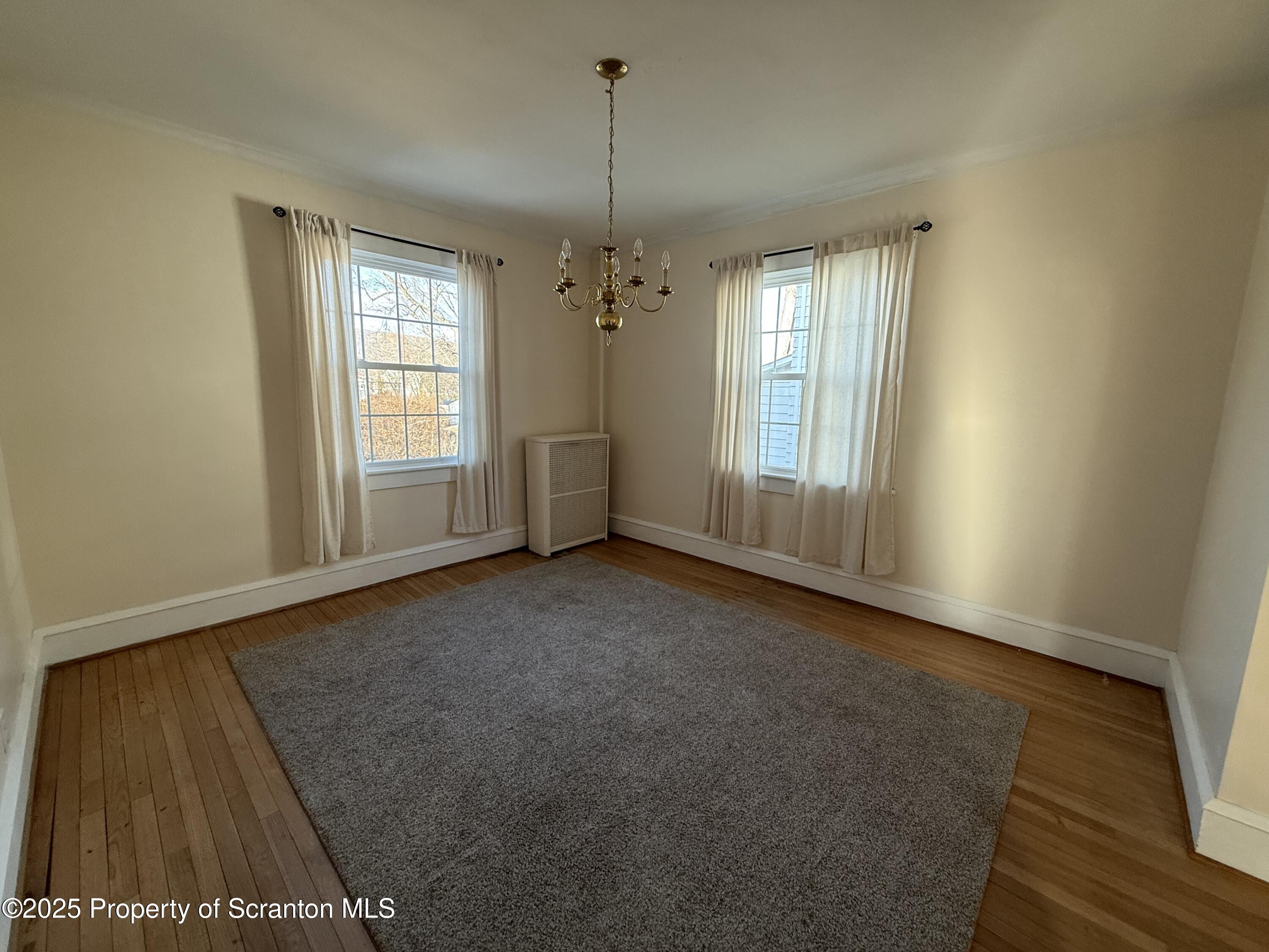 301 Monument Avenue Wyoming, PA 18644 - Photo 11 of 37 a view of livingroom with window