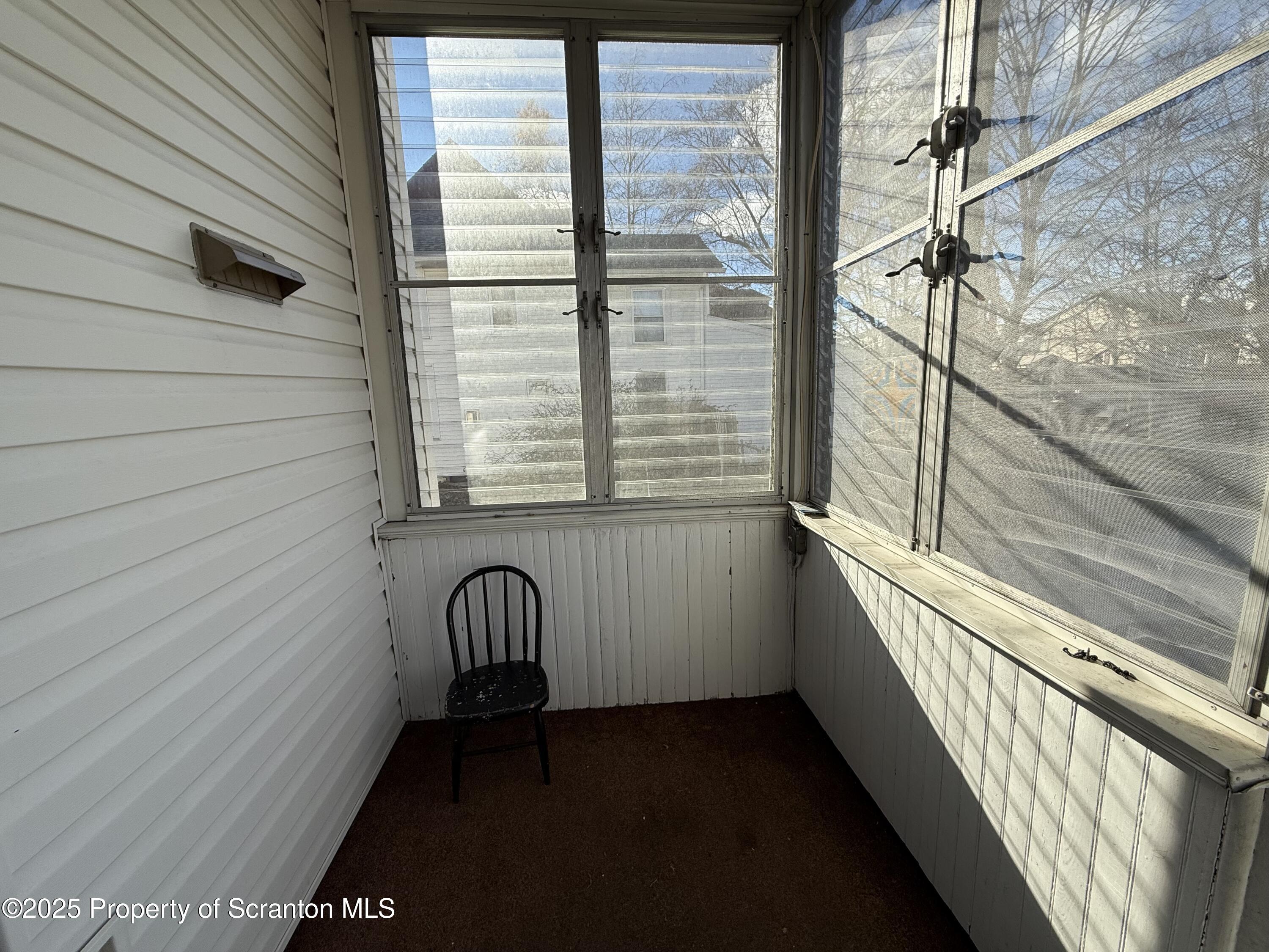 301 Monument Avenue Wyoming, PA 18644 - Photo 17 of 37 a view of a balcony with a door
