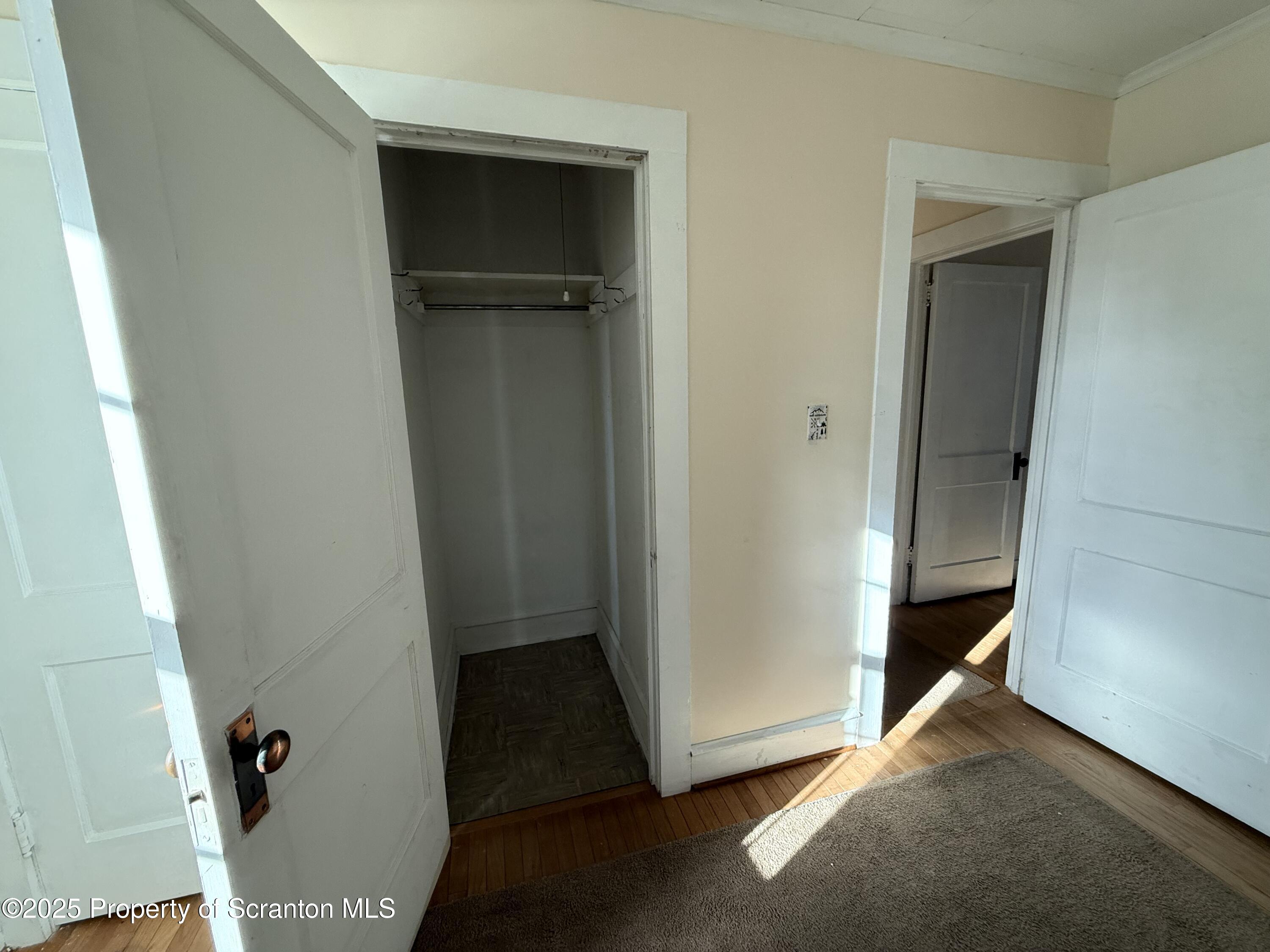301 Monument Avenue Wyoming, PA 18644 - Photo 22 of 37 a view of an empty room