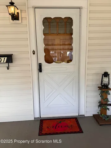 a kitchen with stainless steel appliances granite countertop a sink and wooden cabinets