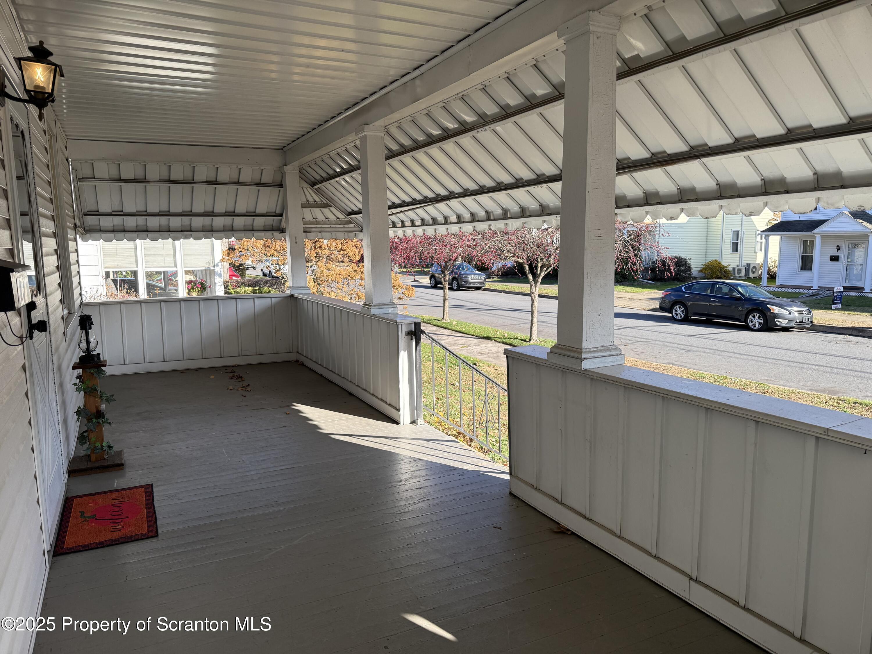 301 Monument Avenue Wyoming, PA 18644 - Photo 5 of 37 a kitchen with stainless steel appliances granite countertop a sink and wooden cabinets