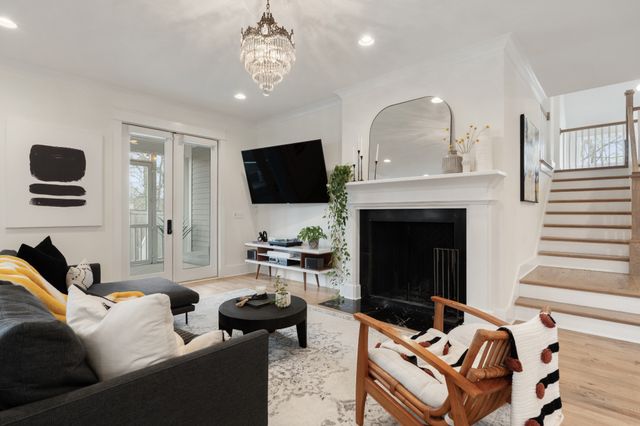 a kitchen with granite countertop a sink appliances cabinets and counter space