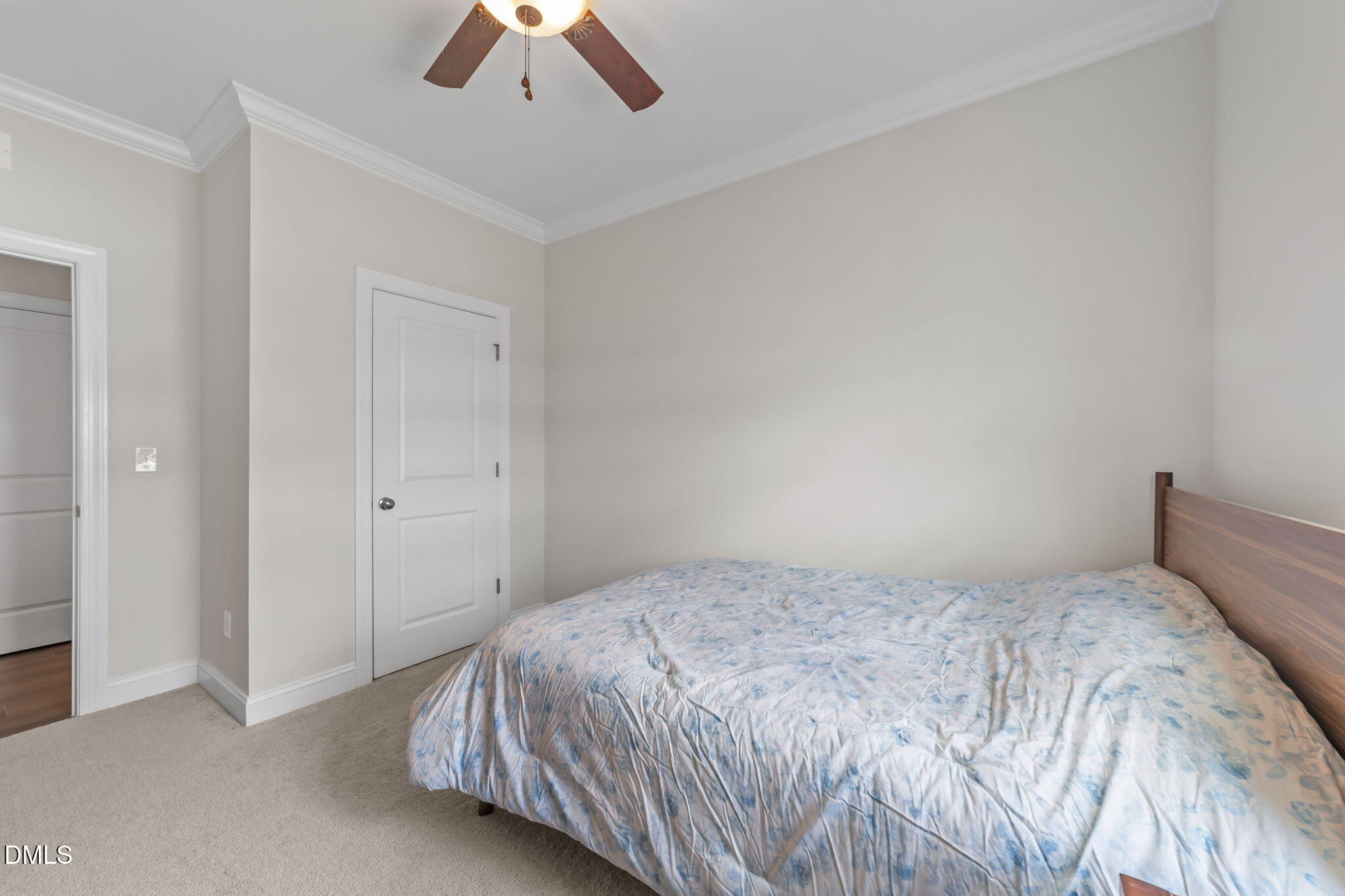 103 Ellsworth Court Garner, NC 27529 - Photo 27 of 48 a bedroom with a bed and a ceiling fan