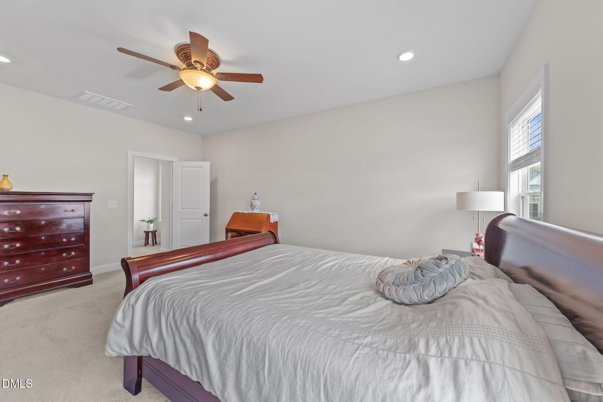 103 Ellsworth Court Garner, NC 27529 - Photo 30 of 48 a bedroom with a bed and window