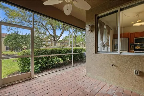 a view of a porch with wooden floor and stairs
