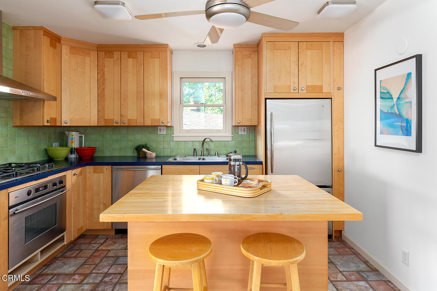 98 Pine Crest Drive South Pasadena, CA 91030 - Photo 12 of 33 a kitchen with stainless steel appliances wooden floor dining table and chairs
