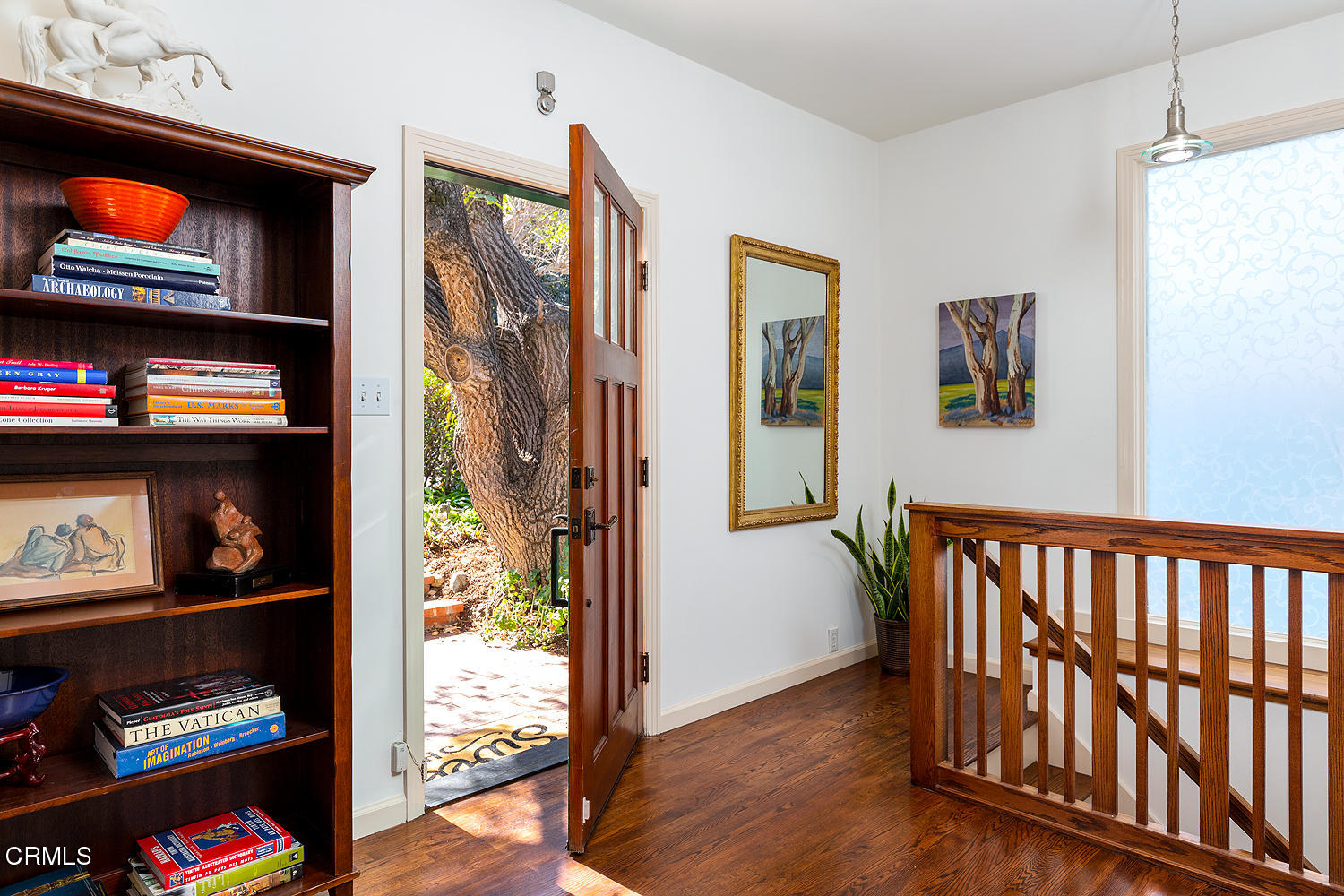 98 Pine Crest Drive South Pasadena, CA 91030 - Photo 4 of 33 a view of a hallway to room with wooden floor and book shelf