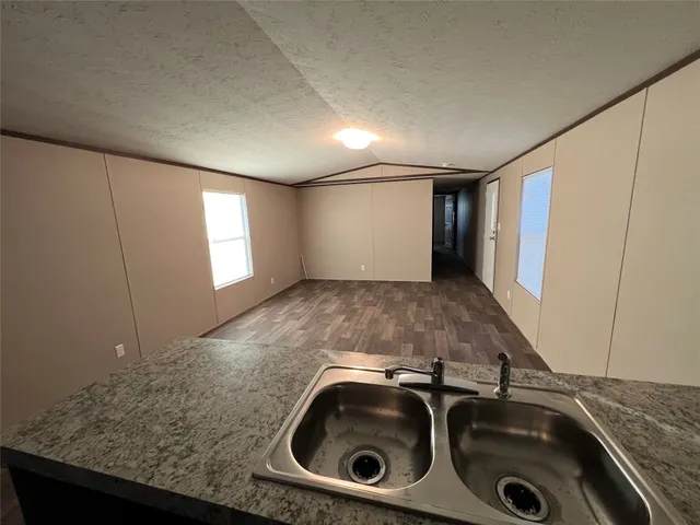 a view of a sink with washer and dryer