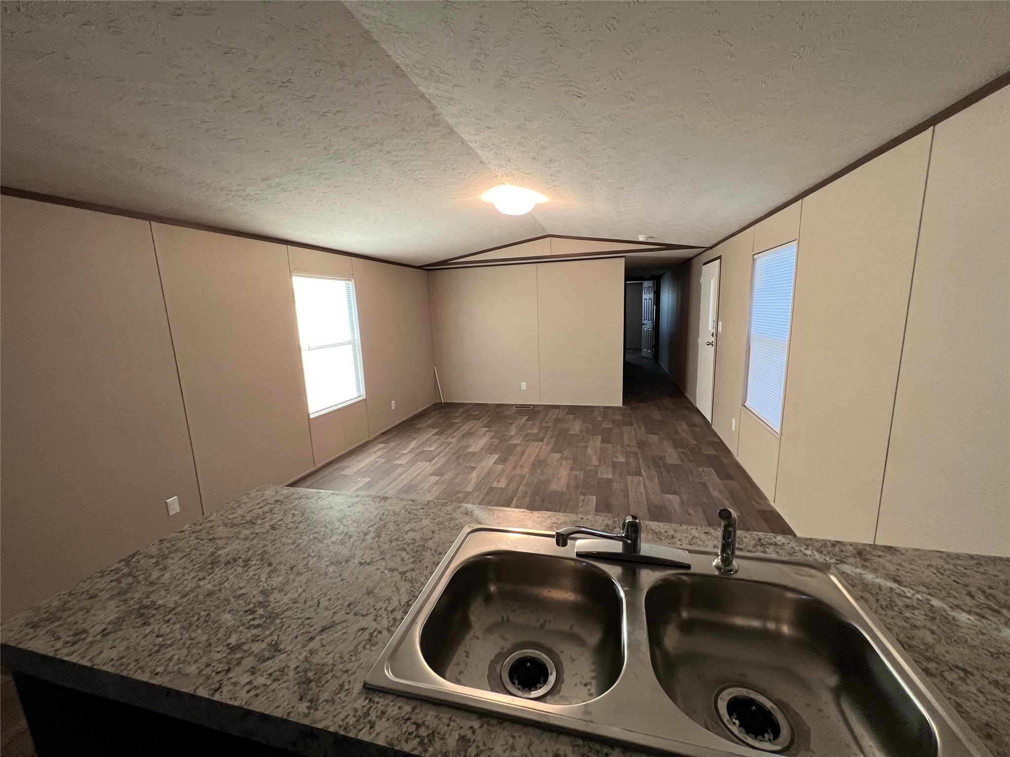 13910 Anchor Court Willis, TX 77318 - Photo 8 of 12 a view of a sink with washer and dryer