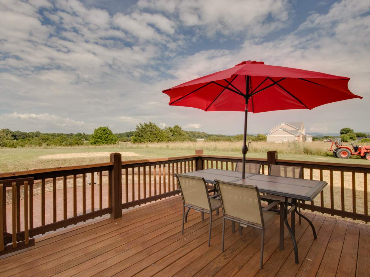 134 Bailey Road Fort Defiance, VA 24437 - Photo 11 of 42 a view of balcony with outdoor seating and wooden floor