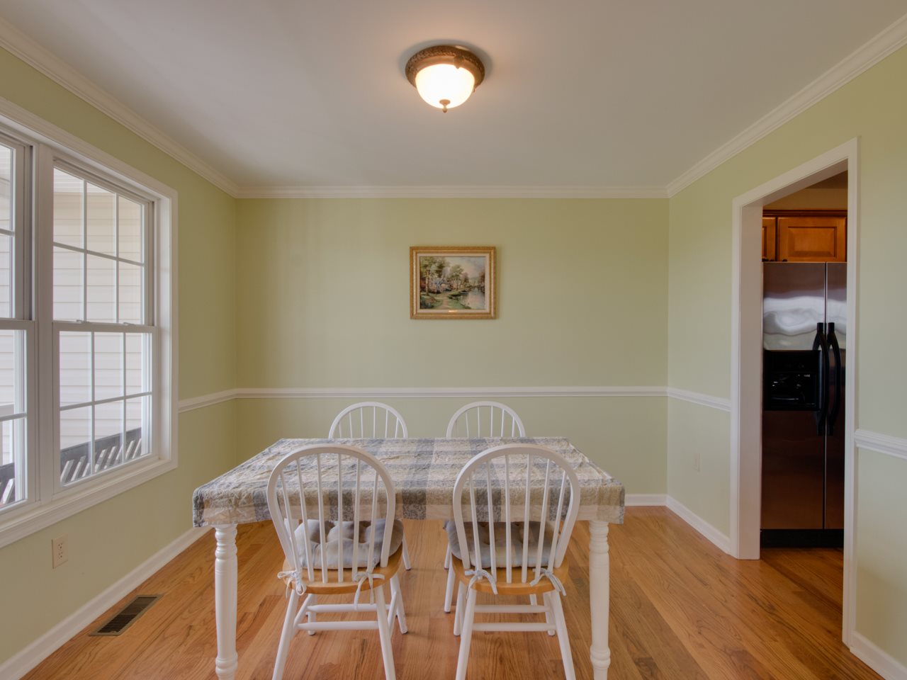 134 Bailey Road Fort Defiance, VA 24437 - Photo 15 of 42 a view of a dining room with furniture and wooden floor