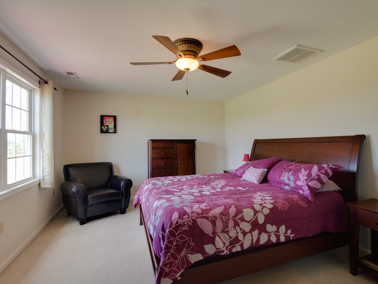 134 Bailey Road Fort Defiance, VA 24437 - Photo 31 of 42 a bedroom with a bed and a couch