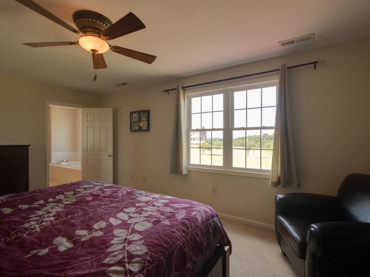 134 Bailey Road Fort Defiance, VA 24437 - Photo 32 of 42 a bedroom with a bed and wooden floor