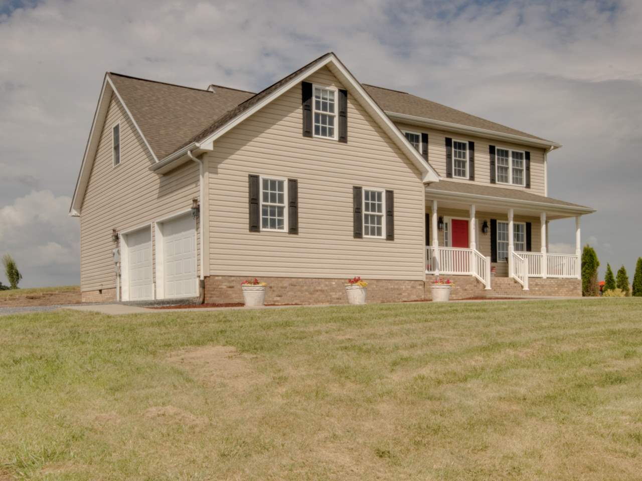 134 Bailey Road Fort Defiance, VA 24437 - Photo 4 of 42 a front view of a house with a garden