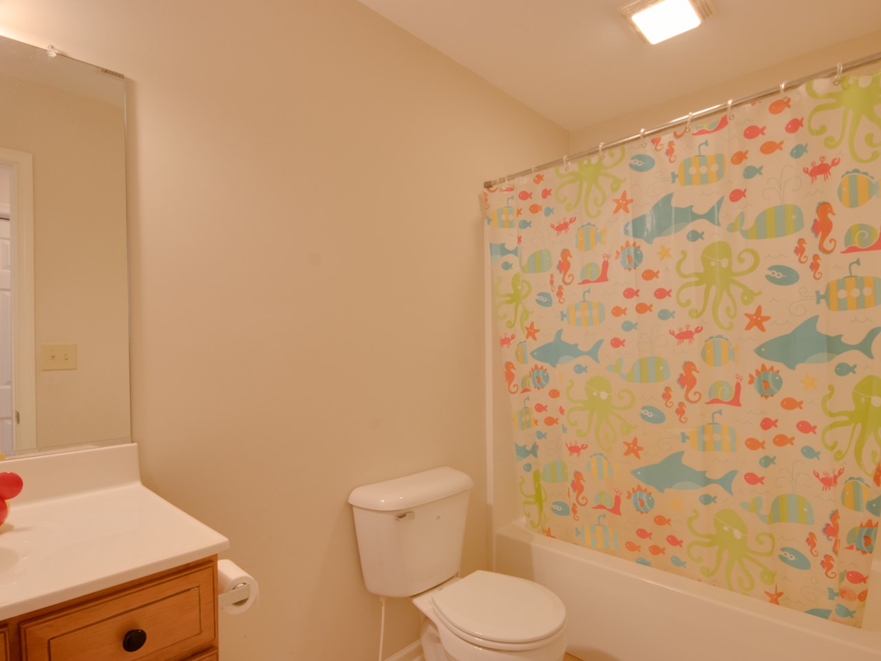 134 Bailey Road Fort Defiance, VA 24437 - Photo 41 of 42 a white toilet sitting next to a shower curtain
