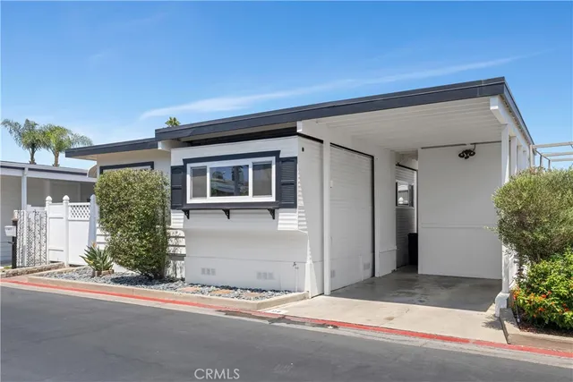 front view of a house with a street