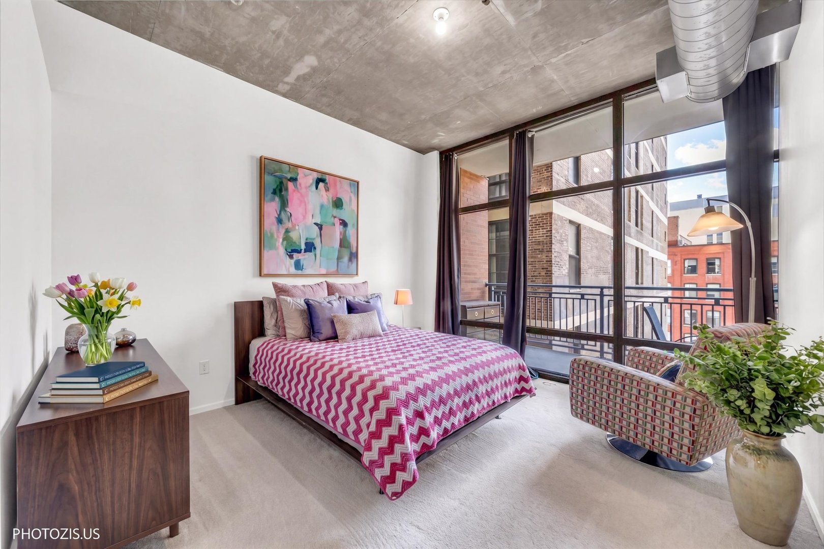 520 South State Street, Unit 712 Chicago, IL 60605 - Photo 15 of 28 a bedroom with a bed and a large window