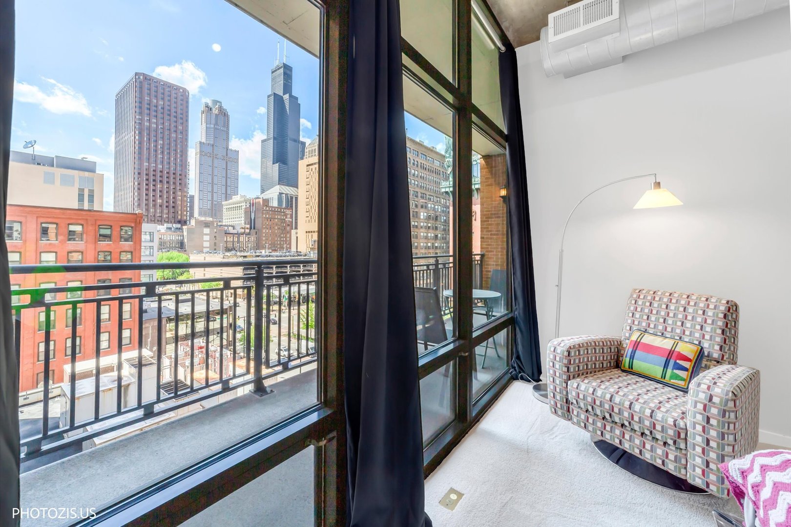 520 South State Street, Unit 712 Chicago, IL 60605 - Photo 16 of 28 a living room with furniture and a large window