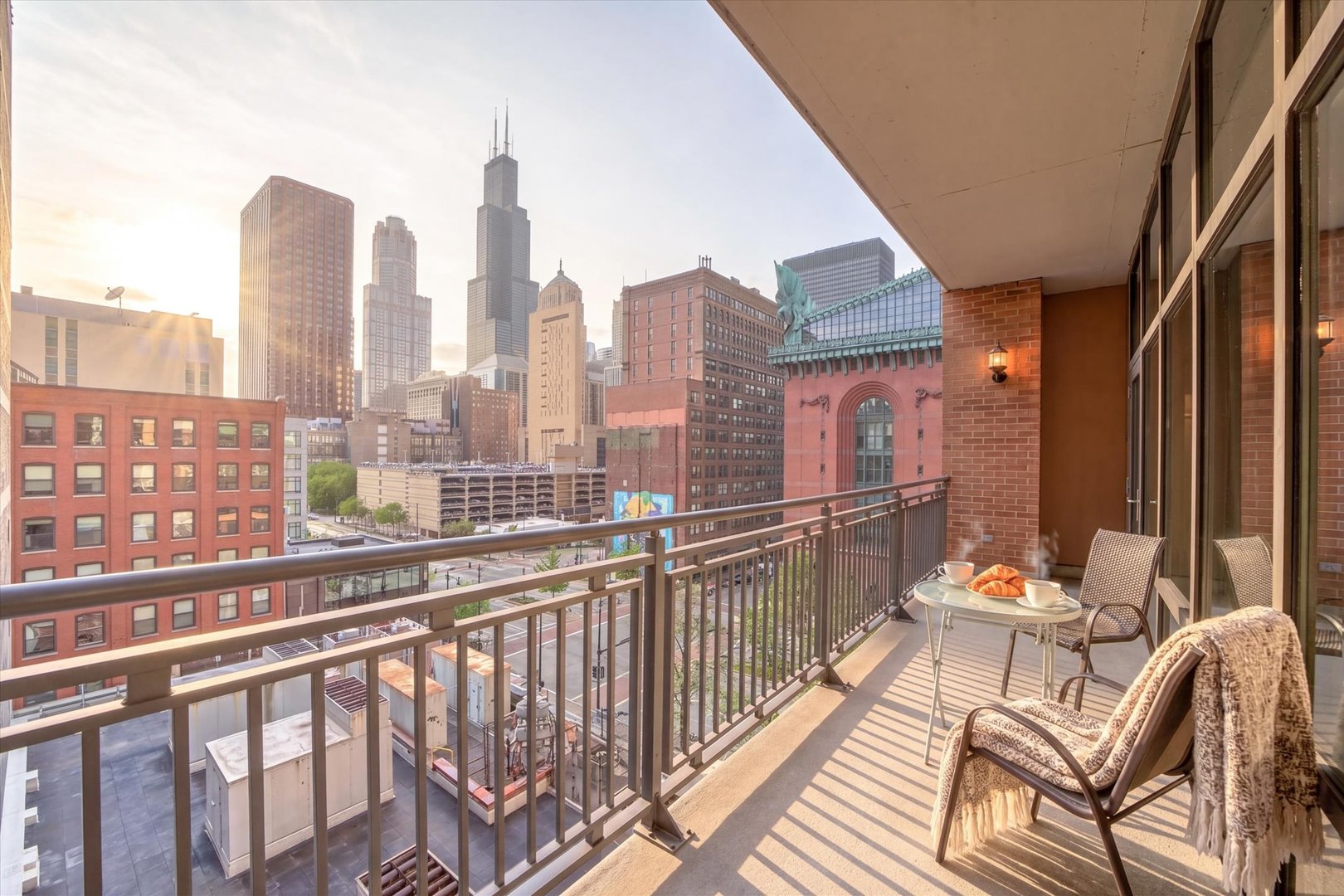 520 South State Street, Unit 712 Chicago, IL 60605 - Photo 21 of 28 a view of a balcony with two chairs and a table