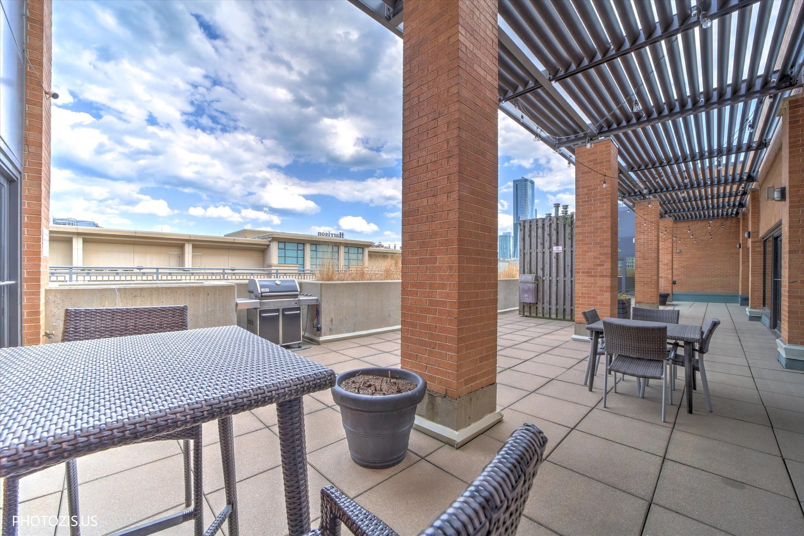 520 South State Street, Unit 712 Chicago, IL 60605 - Photo 27 of 28 a view of a patio with chairs and a potted plant