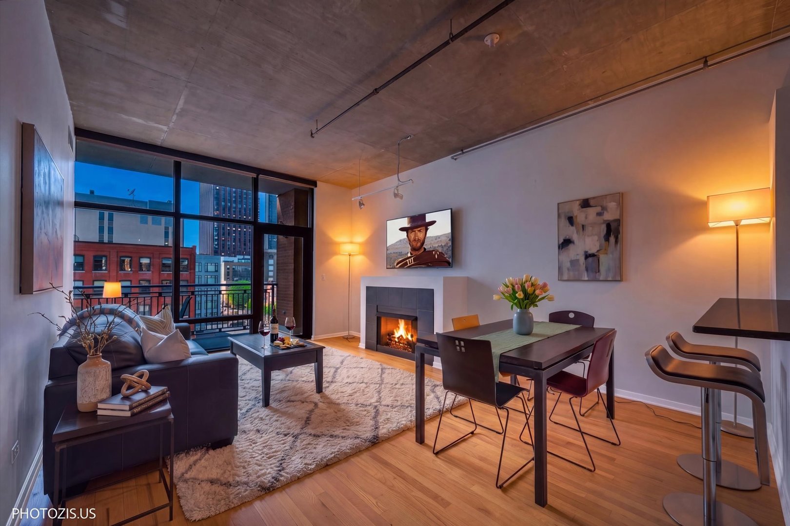 520 South State Street, Unit 712 Chicago, IL 60605 - Photo 7 of 28 a living room with furniture and a fireplace