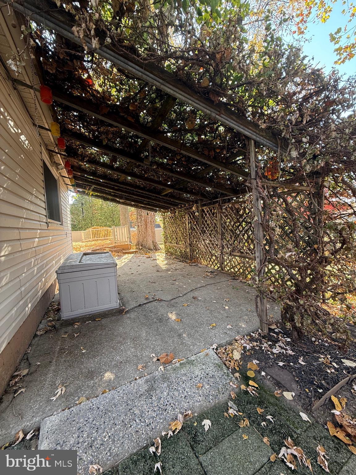 1828 Mare Road Warrington, PA 18976 - Photo 42 of 50 Back patio with wisteria trellis cover