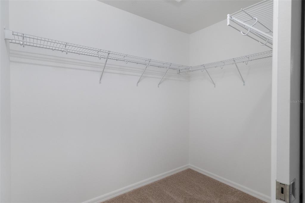 10342 Mirage Avenue Weeki Wachee, FL 34614 - Photo 27 of 45 a view of a room with racks on the wall