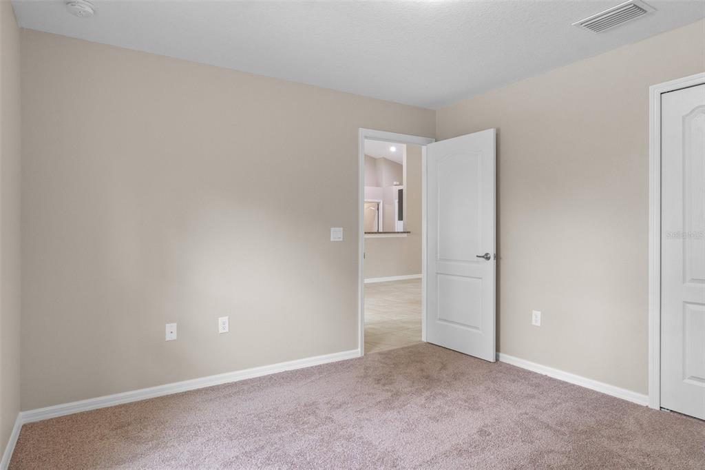 10342 Mirage Avenue Weeki Wachee, FL 34614 - Photo 35 of 45 an empty room with closet area