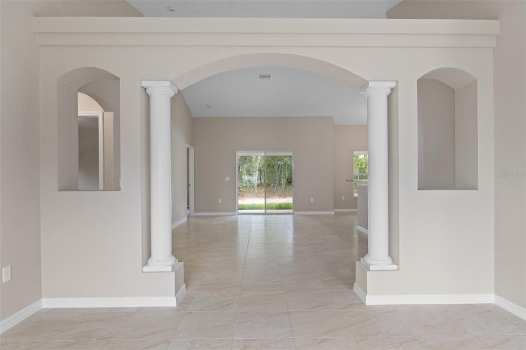 10342 Mirage Avenue Weeki Wachee, FL 34614 - Photo 7 of 45 a view of empty room with window