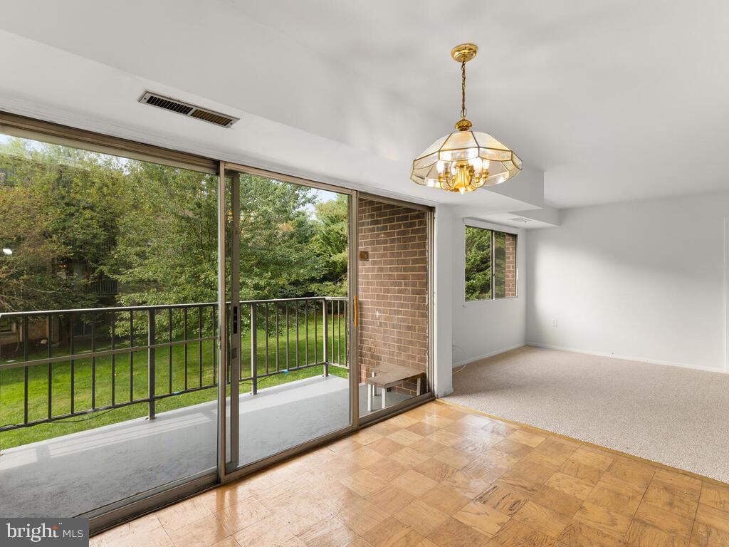 3822 Bel Pre Road, Unit 589 Silver Spring, MD 20906 - Photo 8 of 29 Dining Room/Balcony