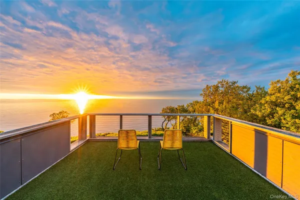 a view of a terrace with chairs