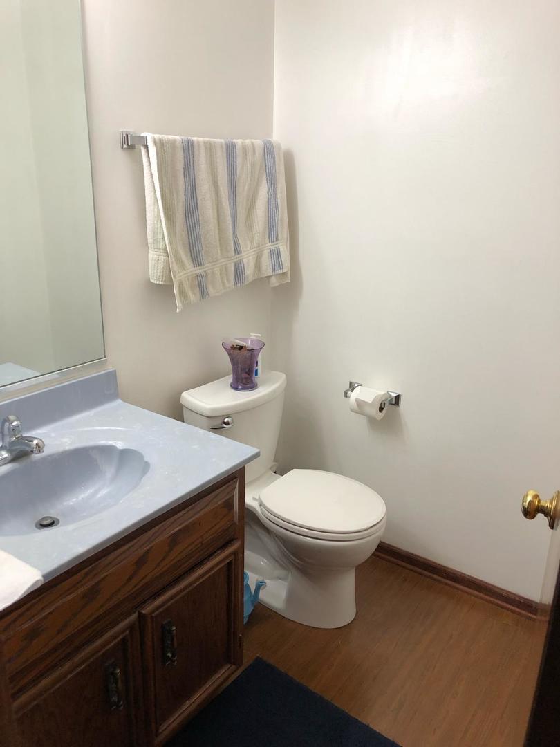 1891 President Street Glendale Heights, IL 60139 - Photo 15 of 23 a bathroom with a sink and a toilet