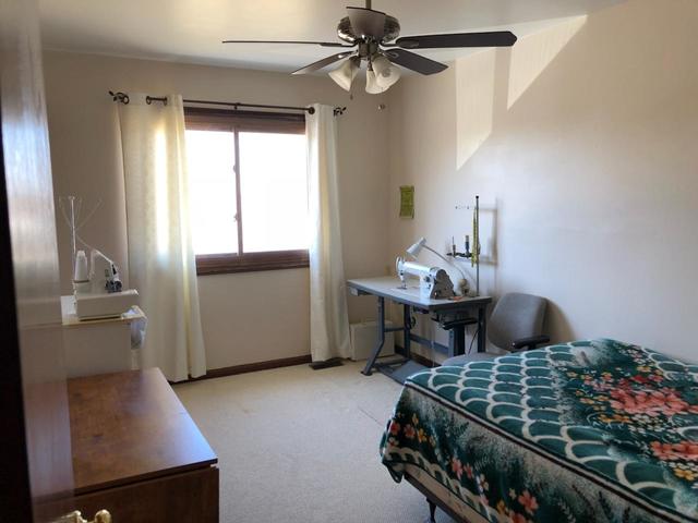1891 President Street Glendale Heights, IL 60139 - Photo 17 of 23 a living room with a couch and a window
