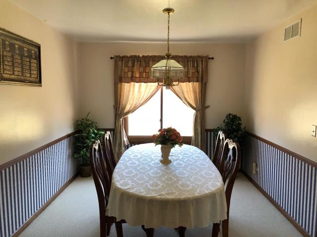 1891 President Street Glendale Heights, IL 60139 - Photo 5 of 23 a dining room with furniture and window