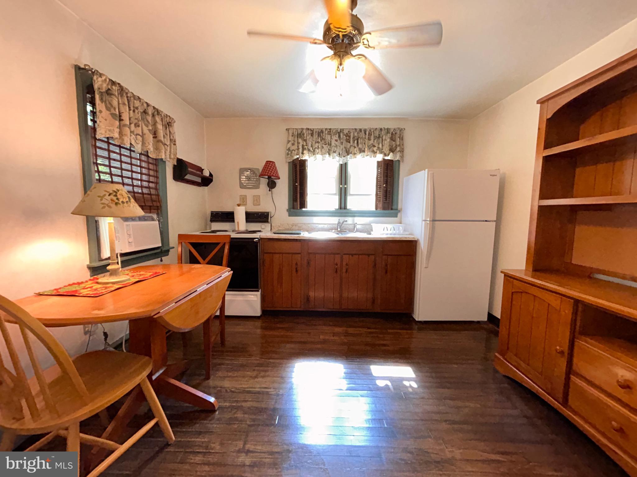 1452 Welsh Road Reading, PA 19607 - Photo 13 of 28 a view of a dining room with furniture window and wooden floor