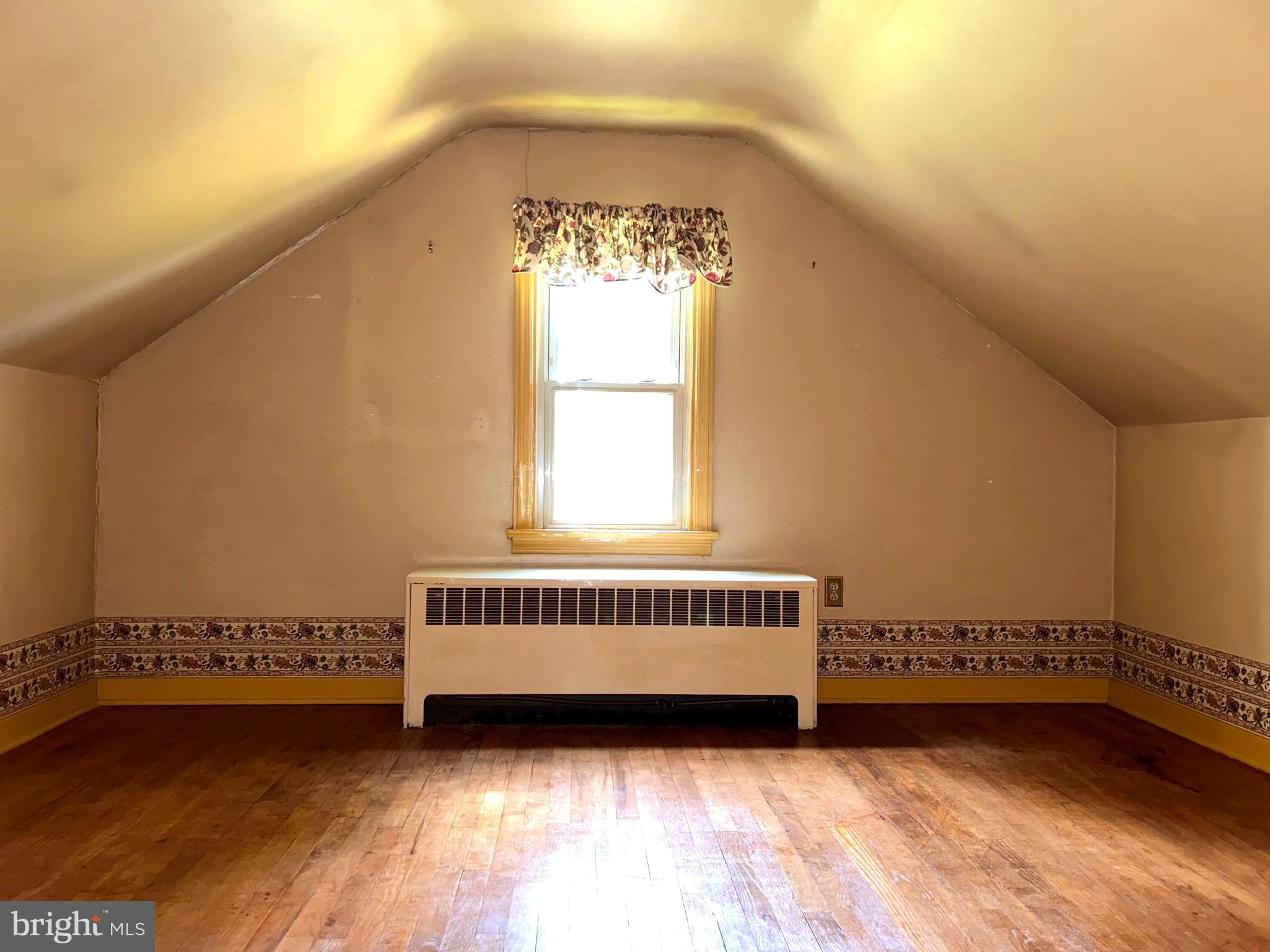 1452 Welsh Road Reading, PA 19607 - Photo 20 of 28 a view of a room with wooden floor and a window